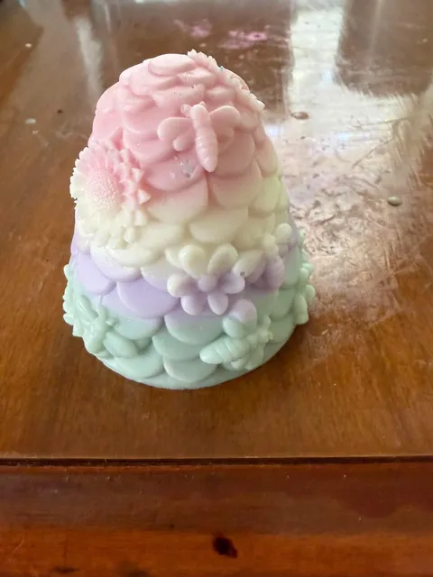 Pastel beehive-shaped soap decorated with flowers