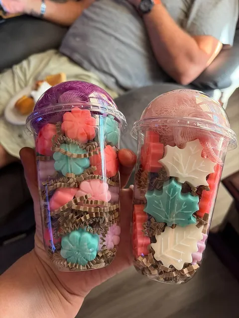 Two gift cups filled with colorful creations